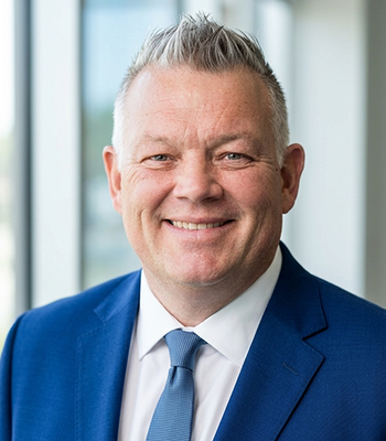 Portrait of Jason Clarke, Realtor® & Head Coach.